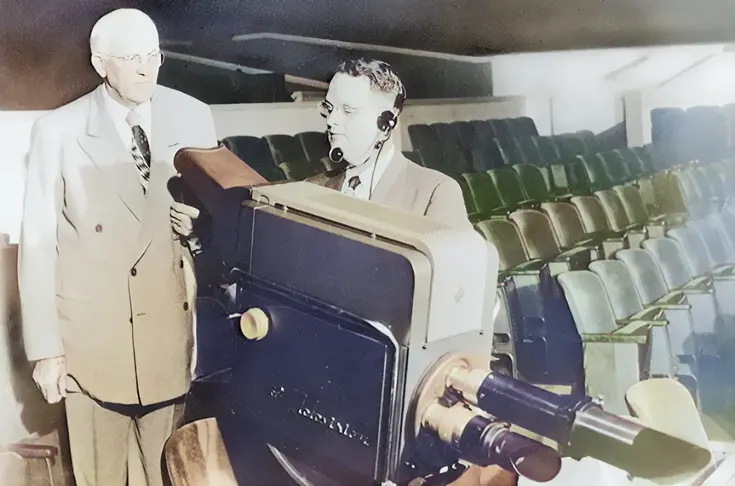image of Dr. lee looking at new camera equipment